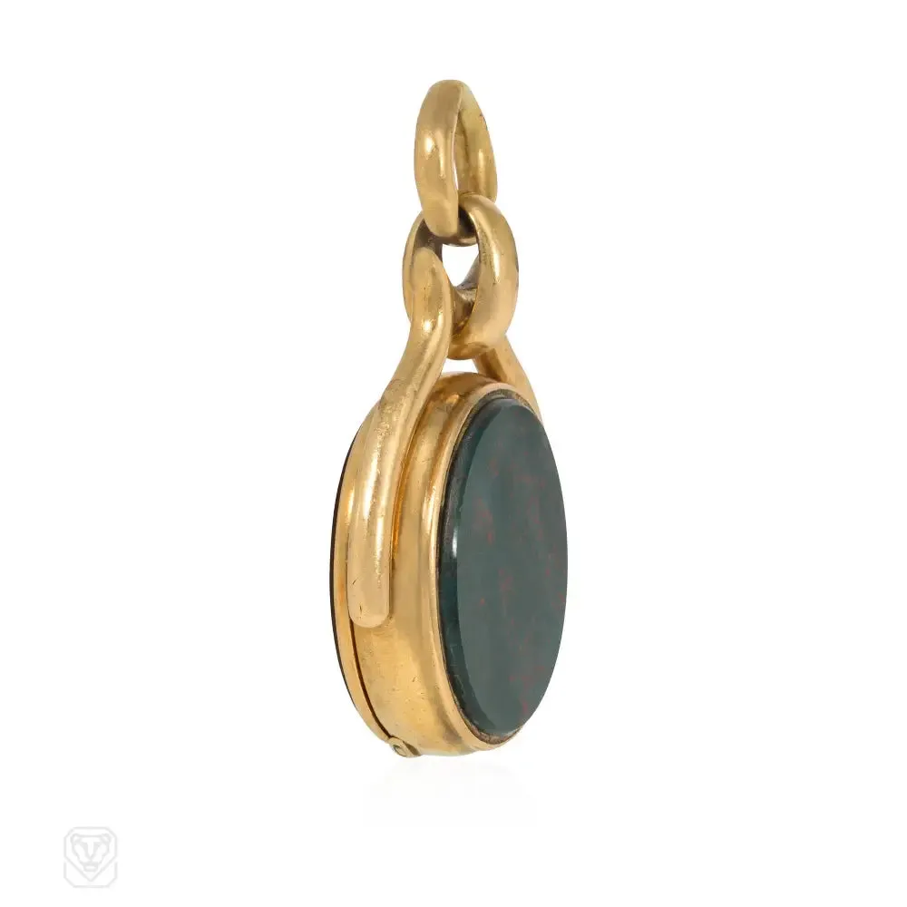 Antique gold, bloodstone, and jasper swivel locket