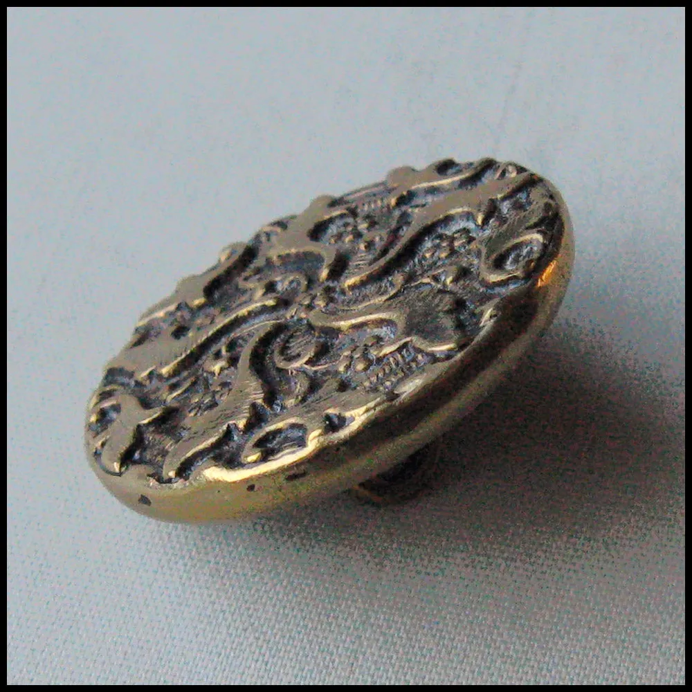 btvc267-Antique stamped ornamental button 7/8 inch.