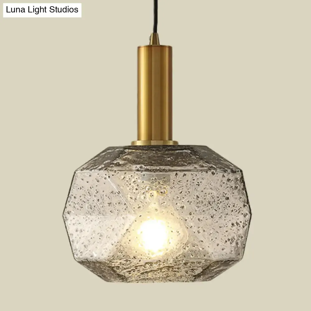 Modern Bedside Pendant Light with Smoky Gray Glass Shade and Brass Base