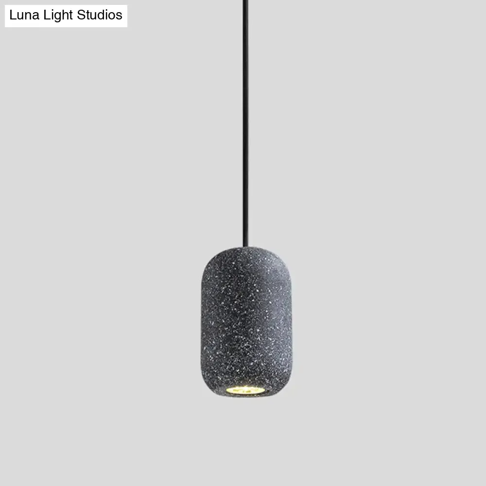 Sleek Single Pendant Light: Geometric Cement Ceiling Fixture for Modern Restaurants